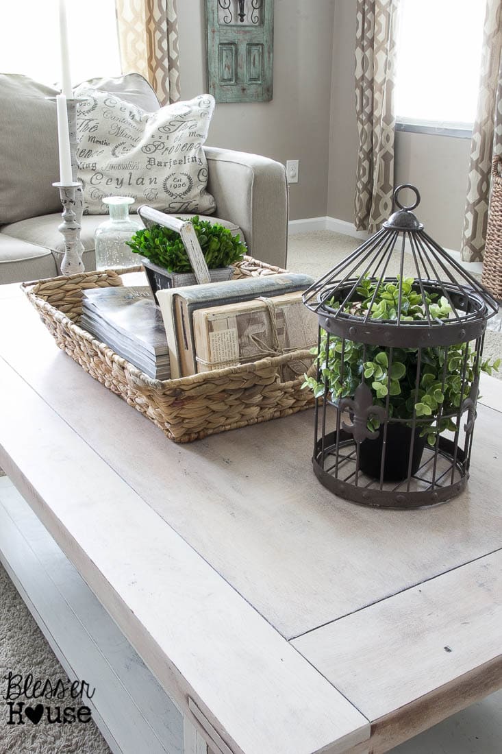 Detailed close-up of the lime waxed coffee table top, emphasizing its smooth texture, natural wood grain, and the subtle white finish achieved with liming wax. A perfect example of a unique furniture finish.
