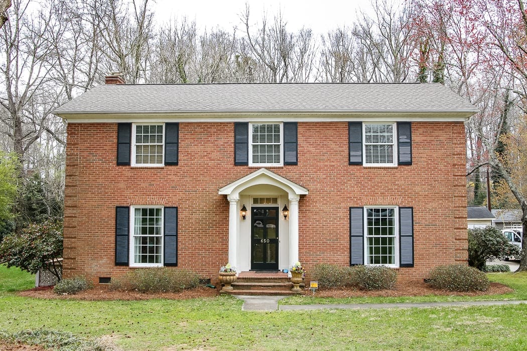 natural orange brick colonial house