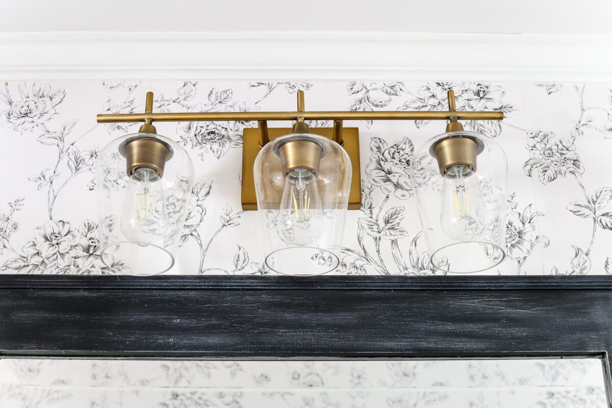 Aqua Meets Urban Powder Room Reveal | blesserhouse.com - A dated powder room gets a modern meets traditional, urban meets farmhouse makeover with aquas, black and white, and antique brass. 