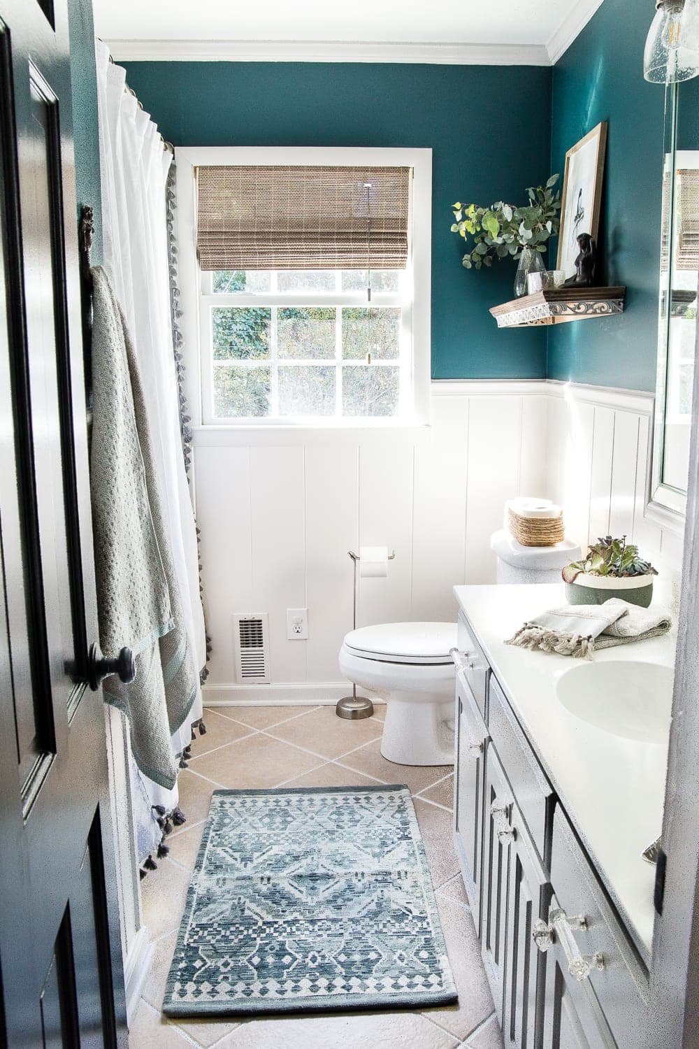 Kid's / Guest Bathroom Makeover on a Budget | blesserhouse.com - A shared kid's / guest bathroom gets a full makeover for less than $500 using just paint, DIY tutorials, and decorating tricks. #bathroom #homeimprovement