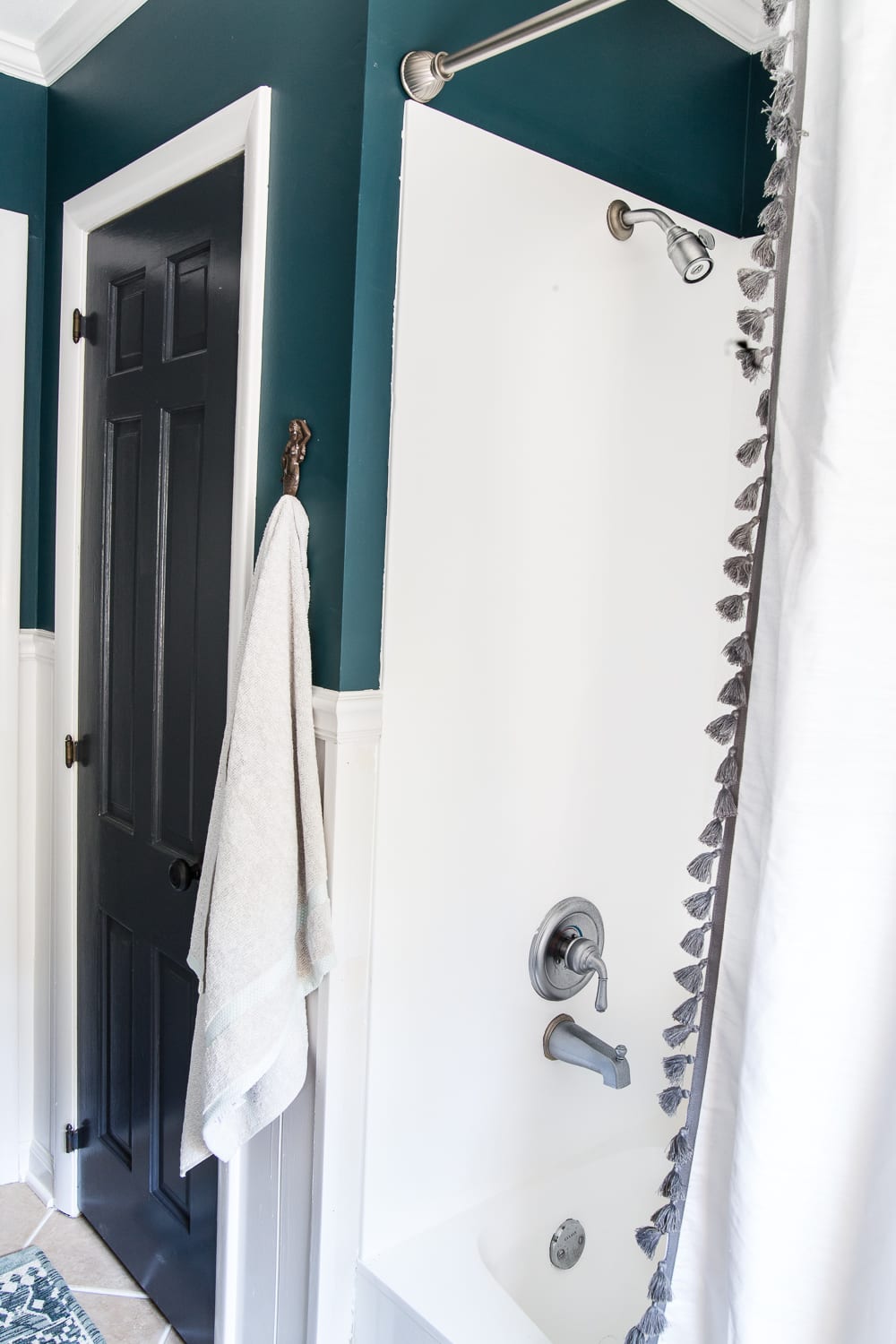 Kid's / Guest Bathroom Makeover on a Budget | blesserhouse.com - A shared kid's / guest bathroom gets a full makeover for less than $500 using just paint, DIY tutorials, and decorating tricks. #bathroom #homeimprovement