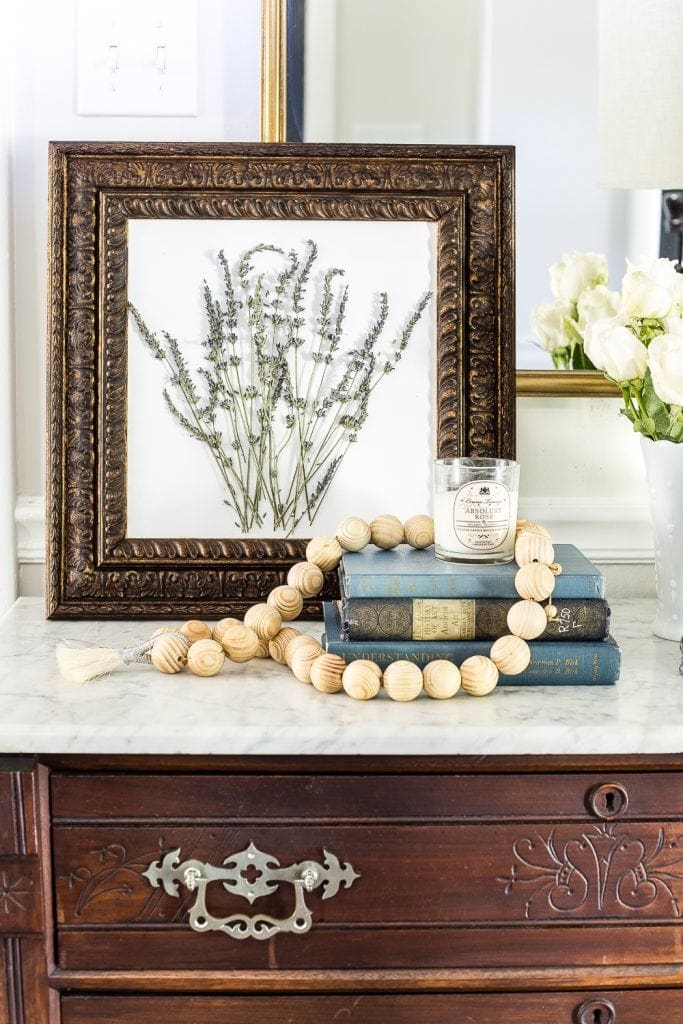 must-have thrift store staple : old frames transformed using aging wax and DIY art