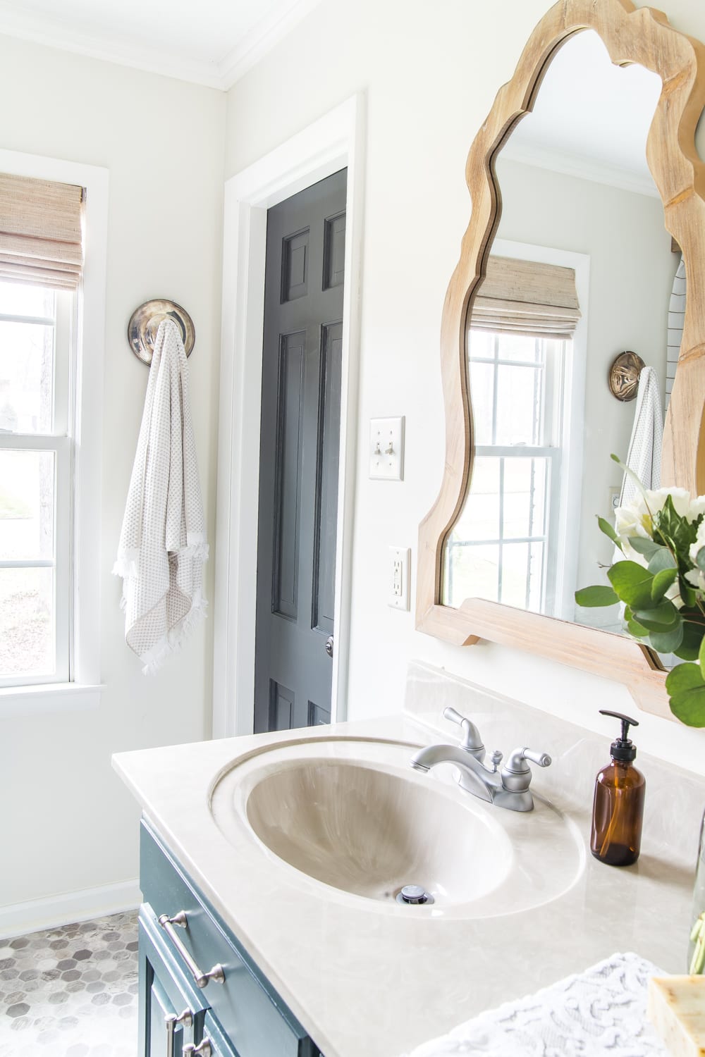 Budget Master Bathroom Refresh Reveal | paint colors: Benjamin Moore Wrought Iron and Benjamin Moore White Dove