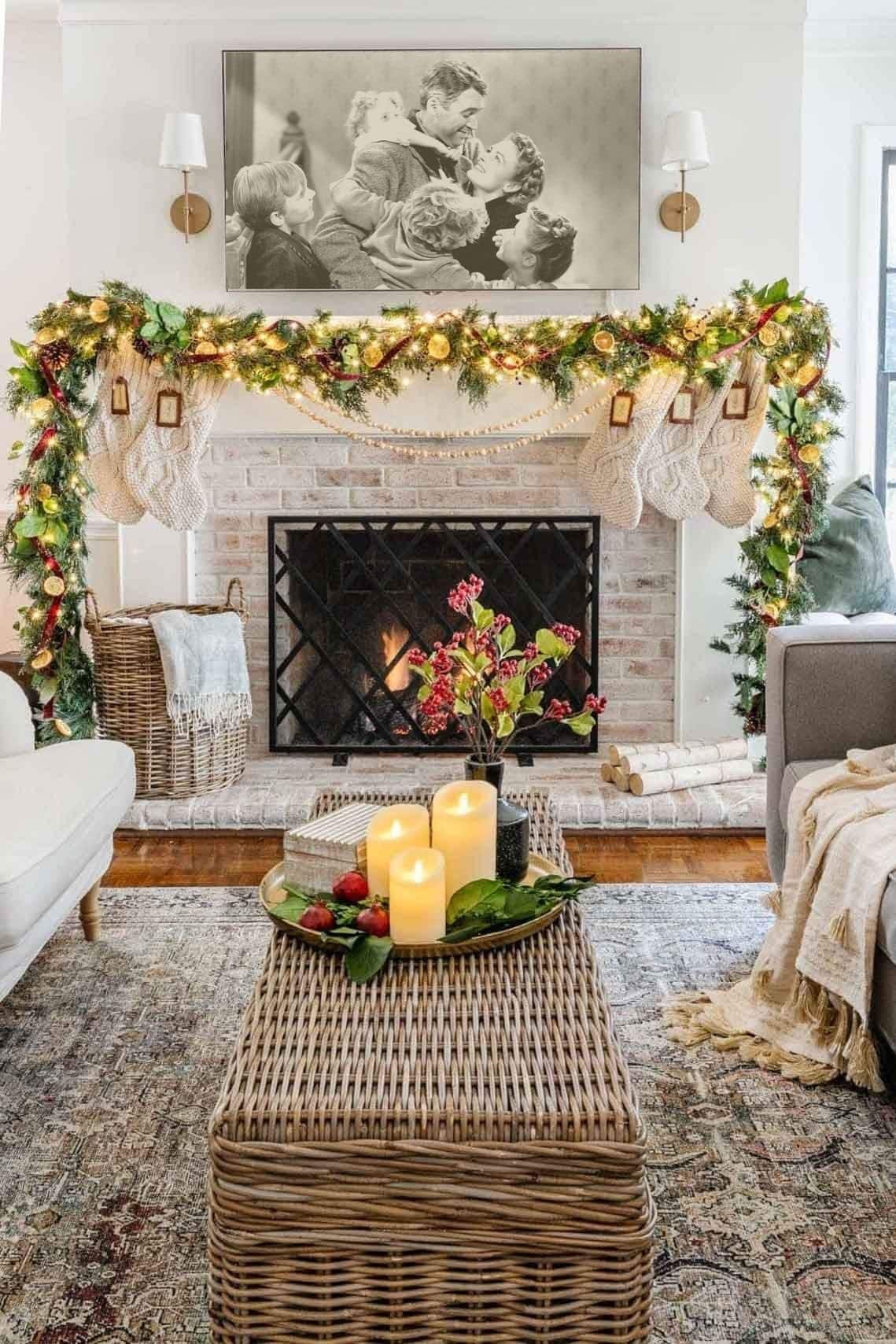 traditional Christmas fireplace garland with dried orange slices, magnolia leaves, and red ribbon