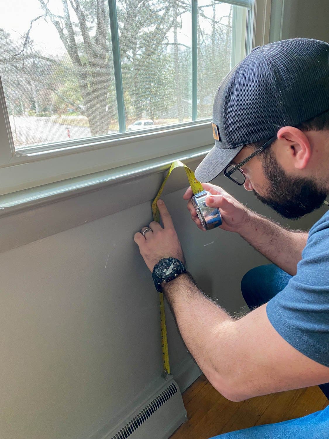 measuring underneath windows for cutting plank spacers