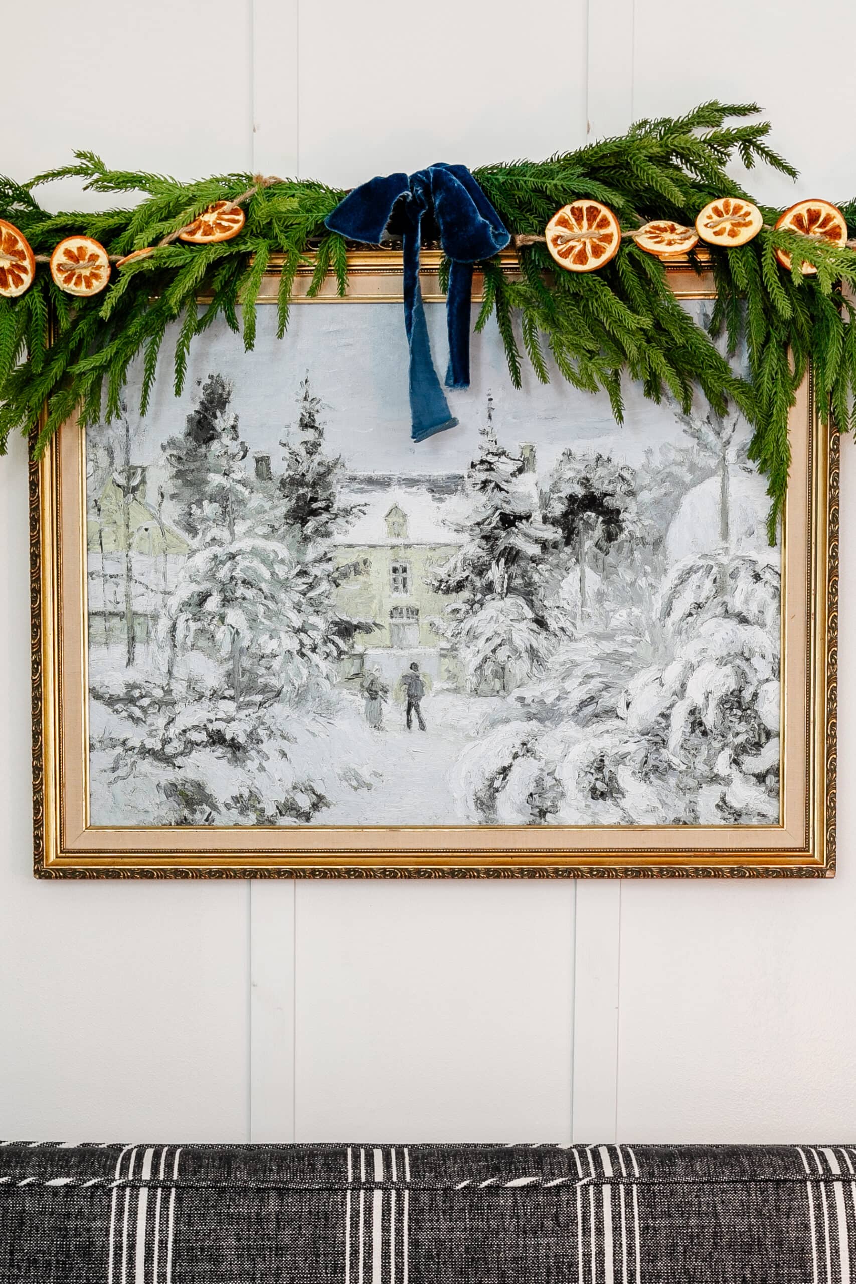 winter art printed in a thrift store picture frame