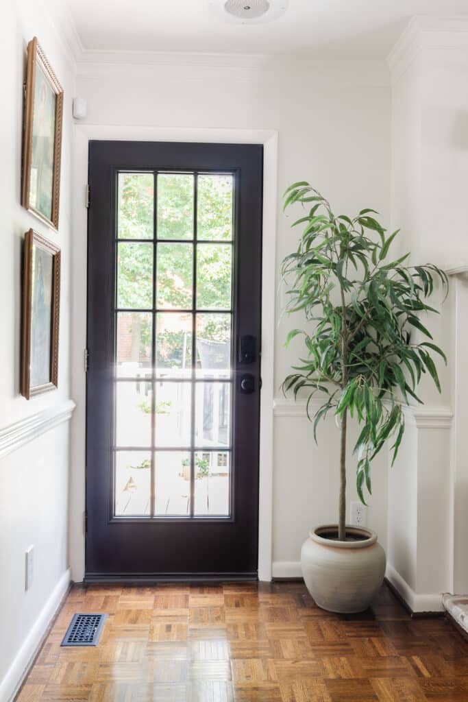 black french door with white walls