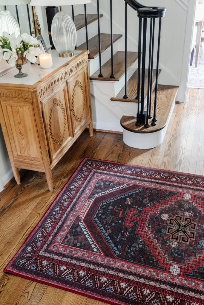 burgundy washable rug in an entryway