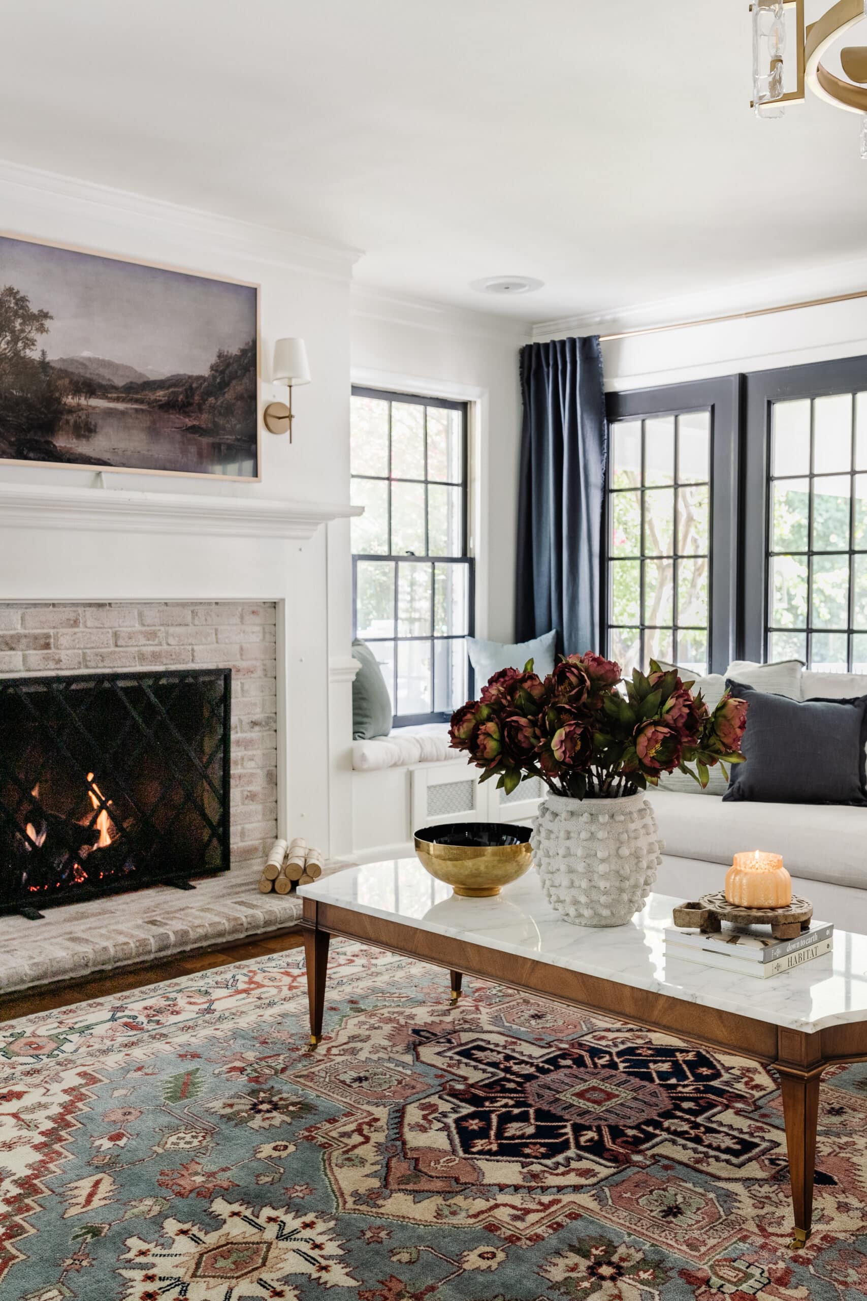 vintage rug in a modern traditional living room with marble coffee table