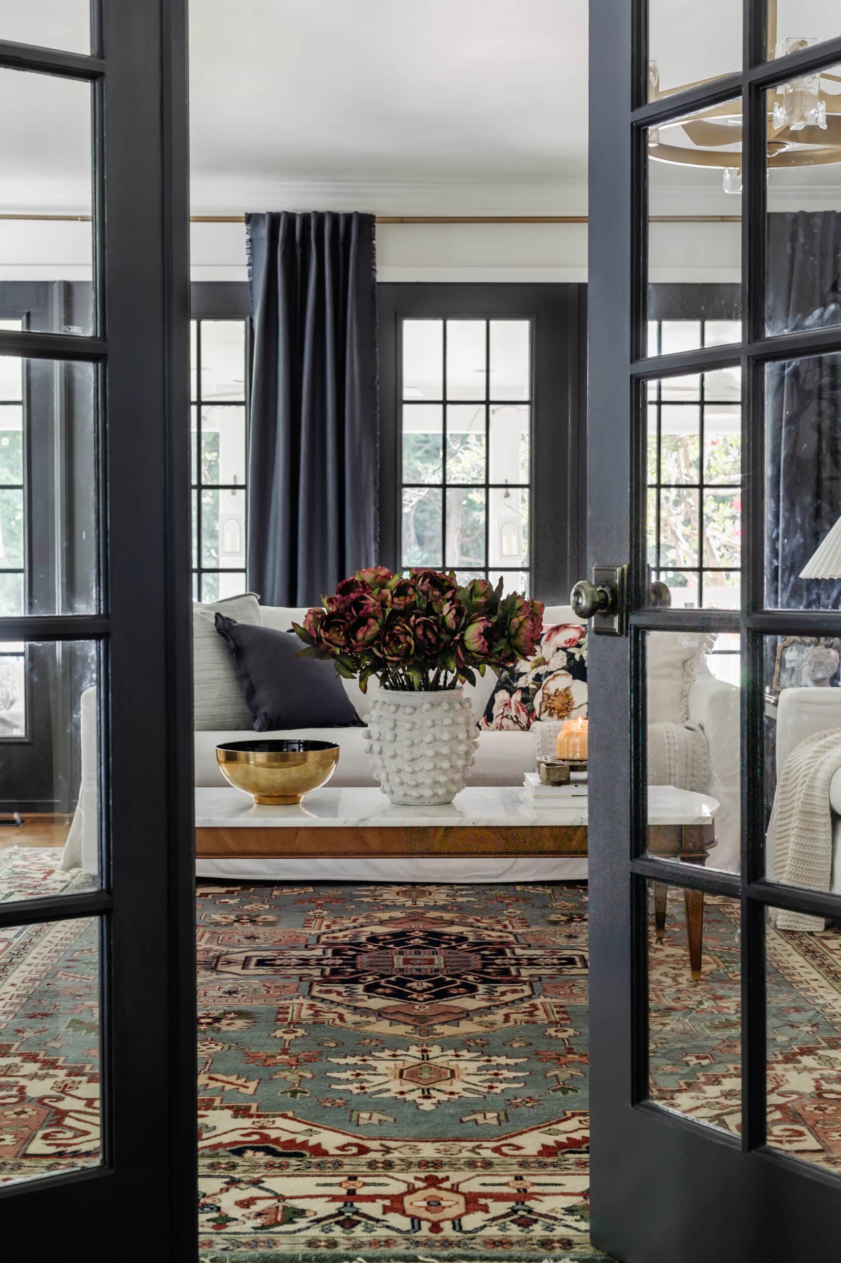 french doors leading into a living room decorated for fall