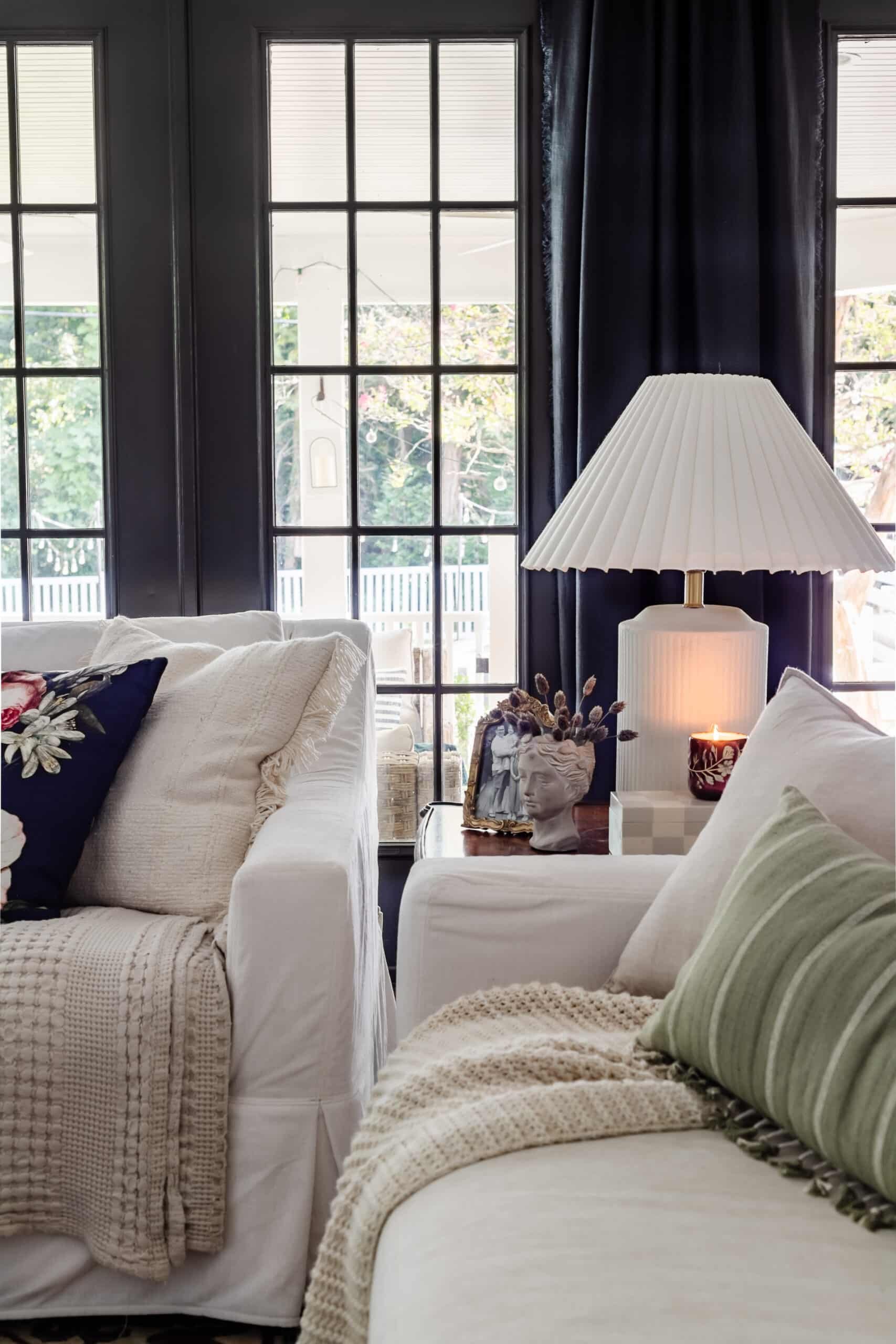 end table decor with mini bust planter, french gold frame and pleated table lamp