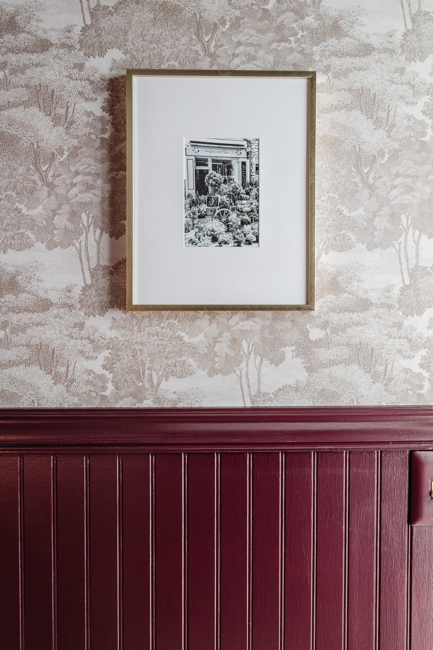 Rebel Walls Saint Sebastian wallpaper and beadboard painted Farrow and Ball Brinjal