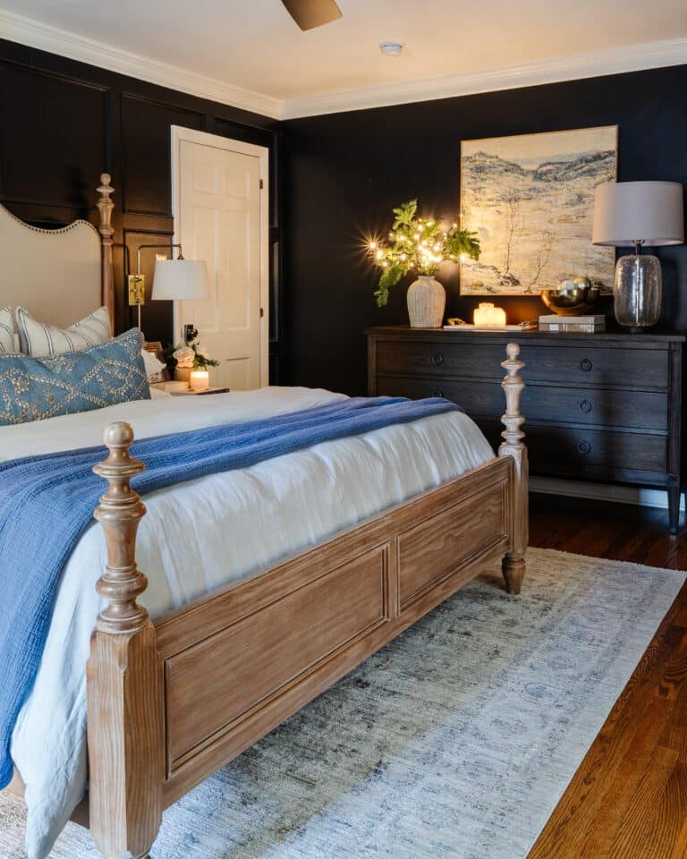 christmas bedroom decor with light up branches on a dresser