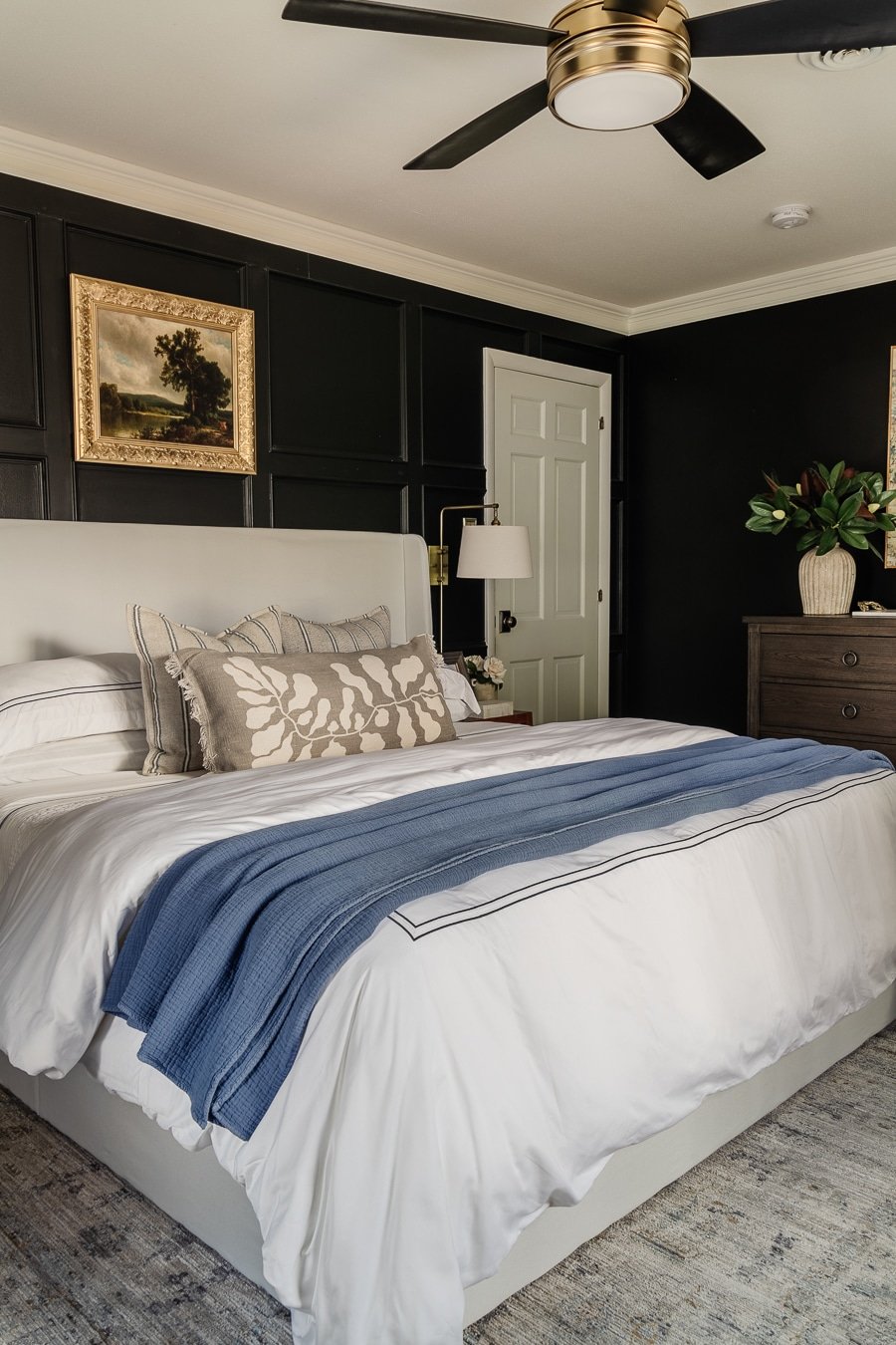 white wingback storage bed from amazon in black bedroom