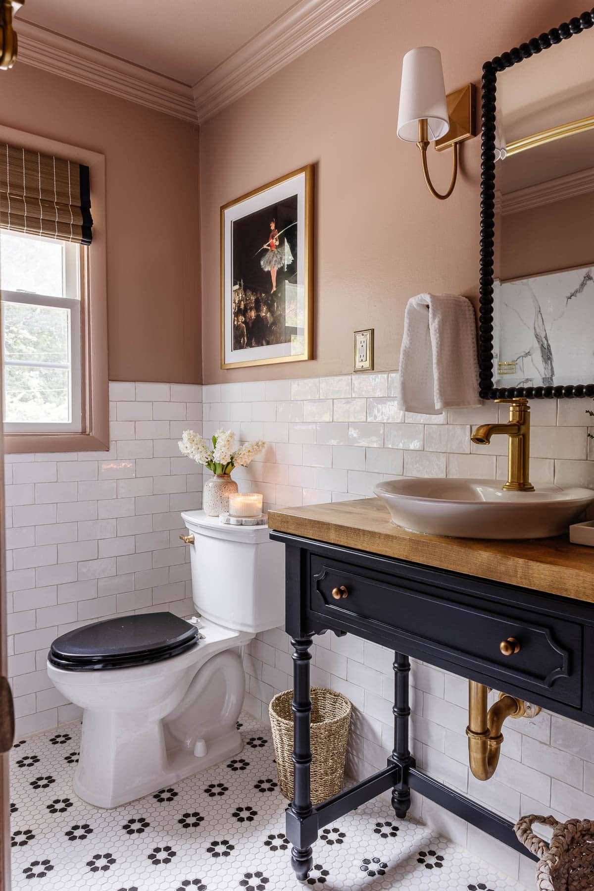 Behr Postmodern Mauve bathroom with flower hex tile floor and black and white bathroom decor