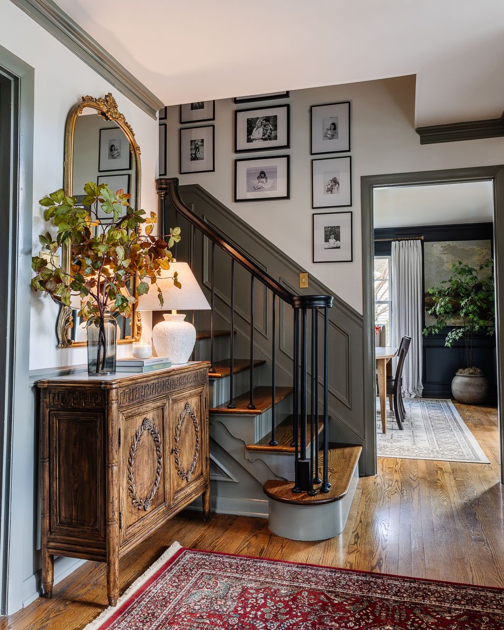 modern traditional foyer decorating ideas with contrast trim and credenza decor