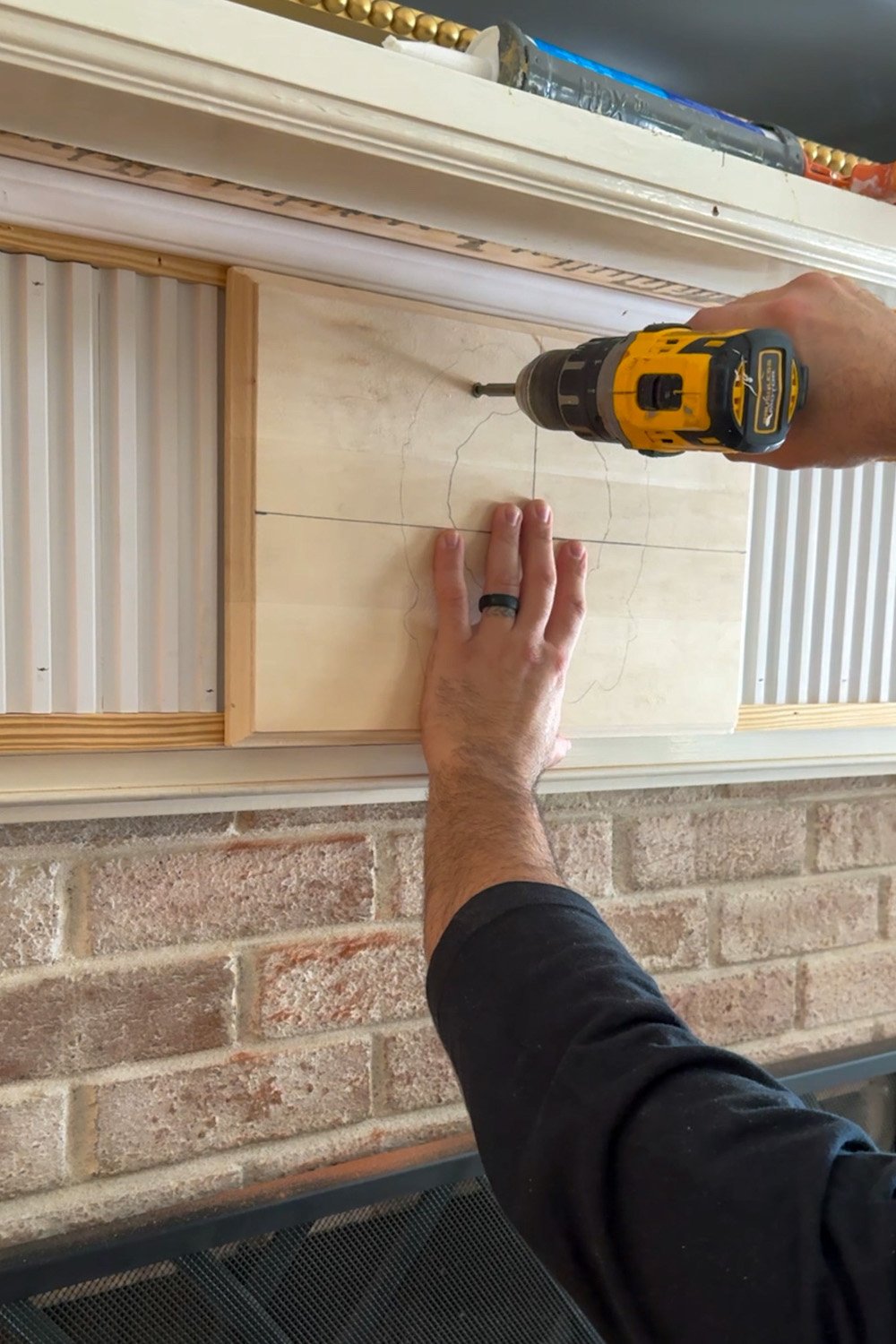 attaching overlay plinth to fireplace front