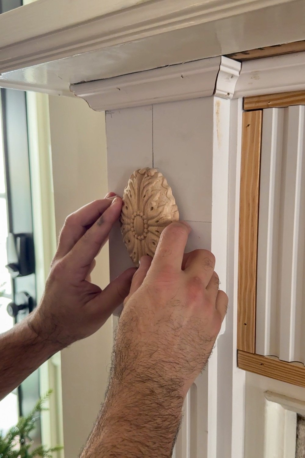adding rosette overlay molding to fireplace