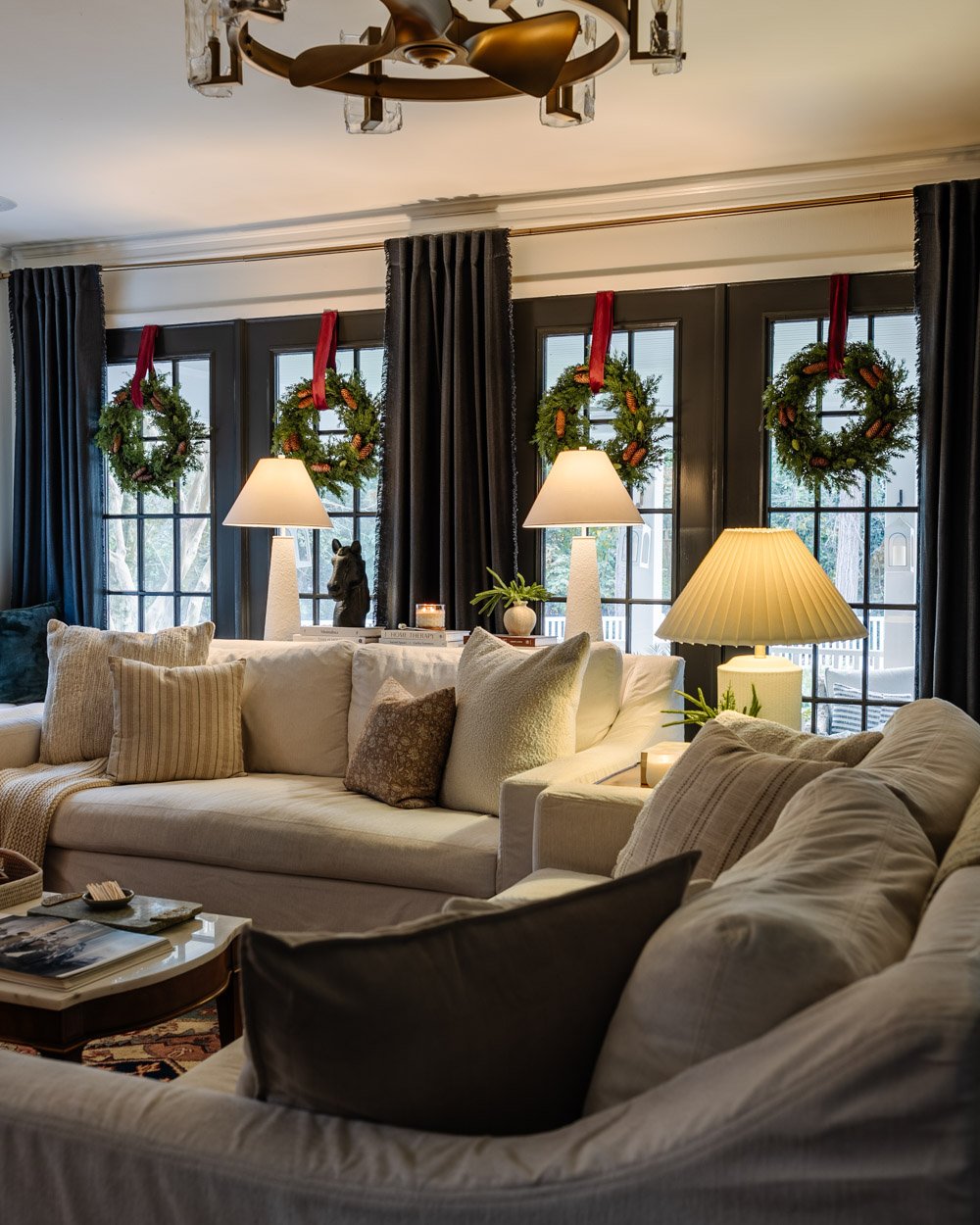 hanging window wreaths as living room Christmas decor