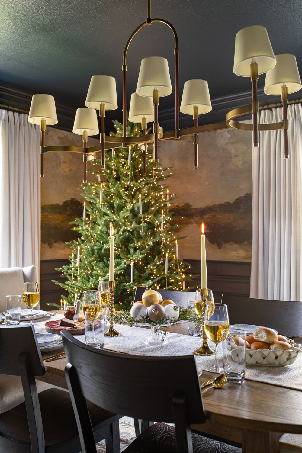 simple Christmas dining table decor beside tree