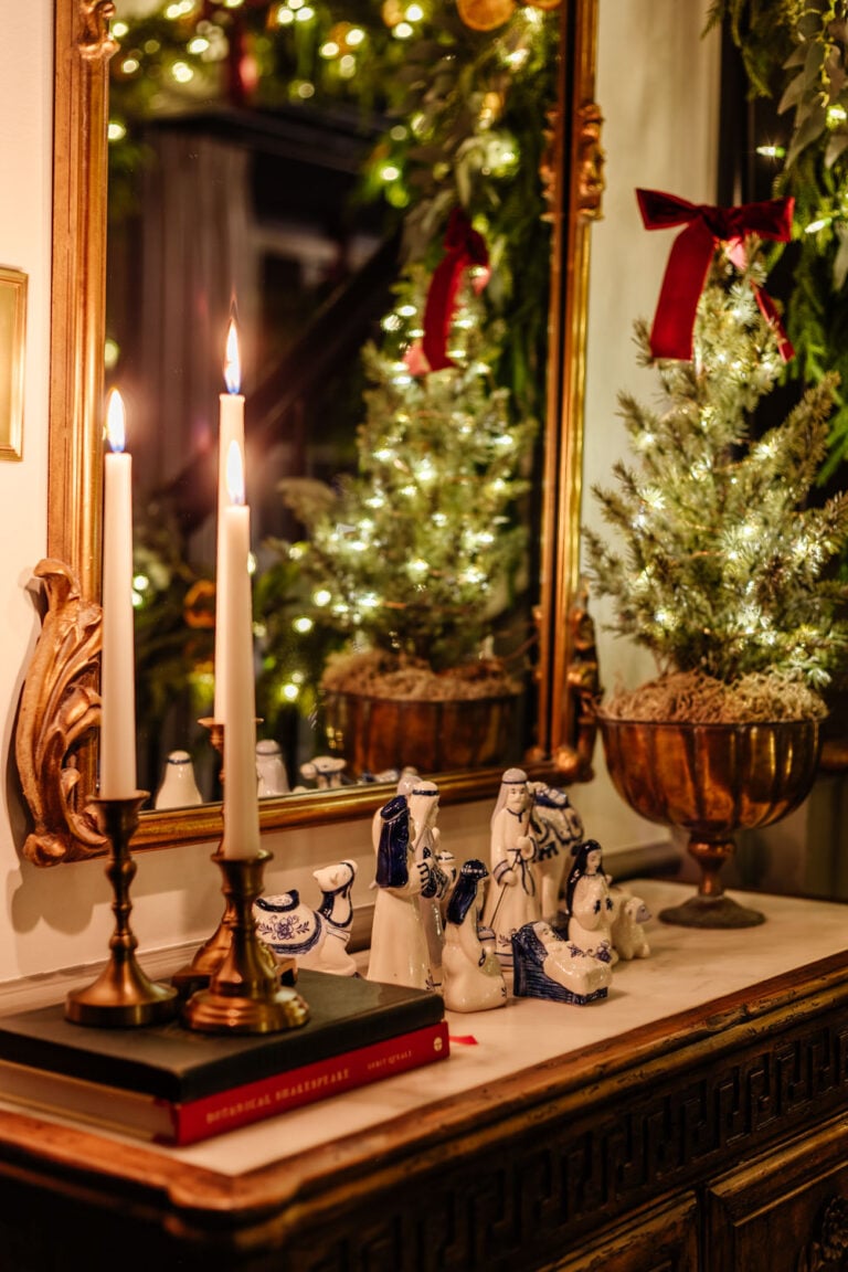 candlelight Christmas entryway table with nativity