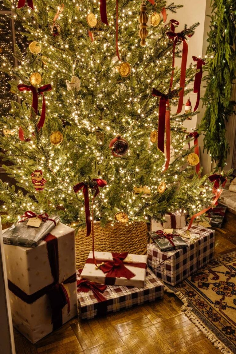 candlelight Christmas tree with gifts