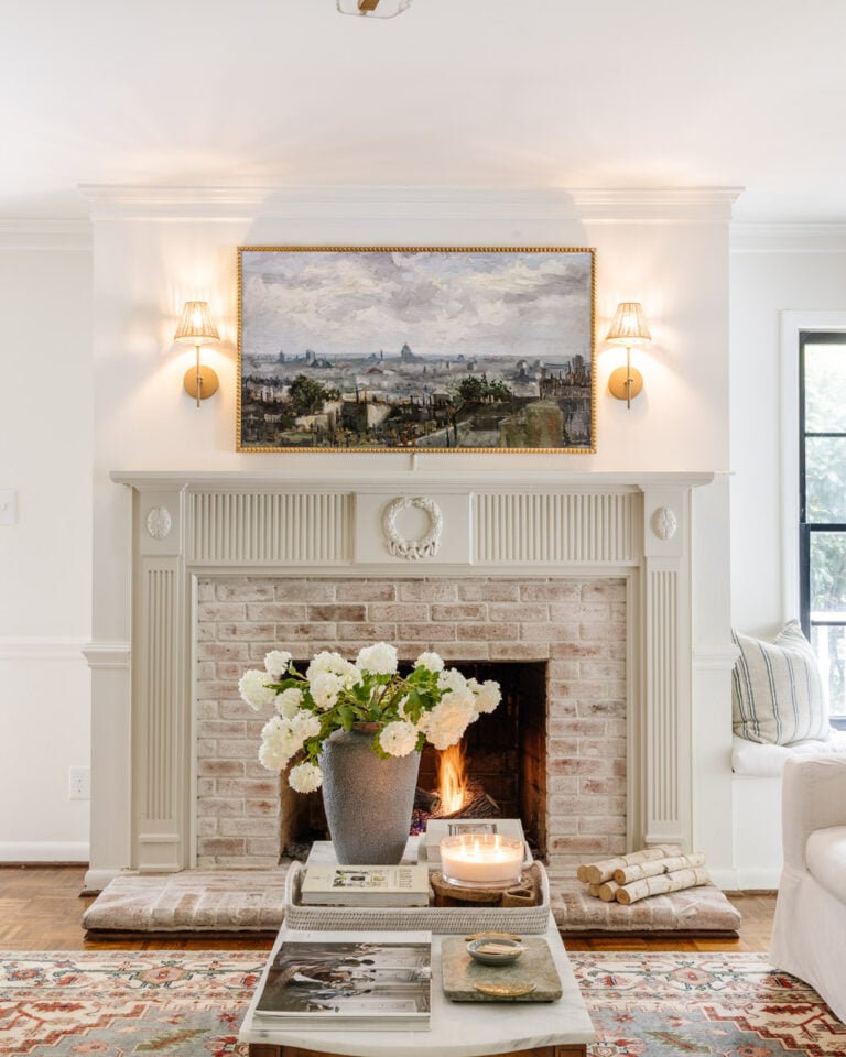 living room mantel with decorative ornate molding
