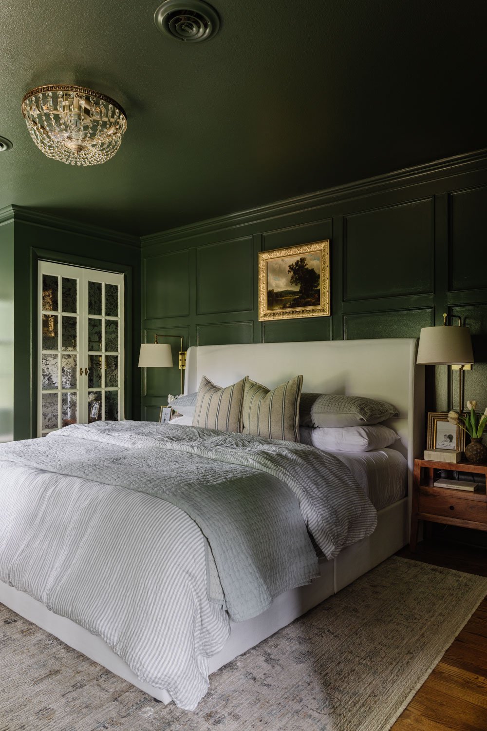 crystal fandelier in an olive green bedroom