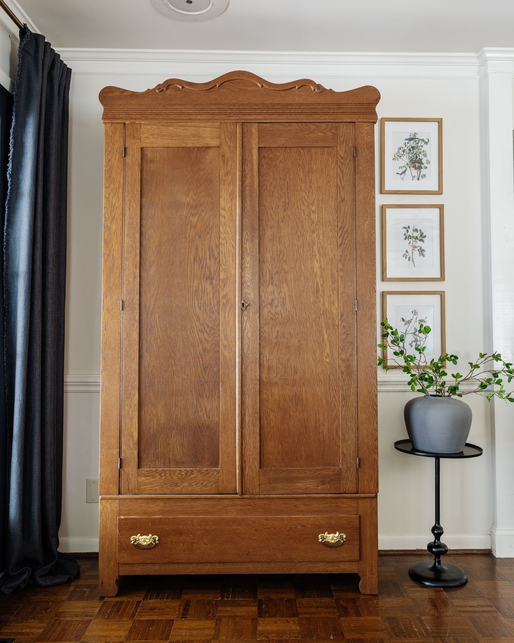 armoire coat closet in an entryway for storage without a mudroom
