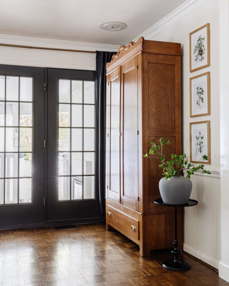 armoire coat closet in an entryway for storage without a mudroom