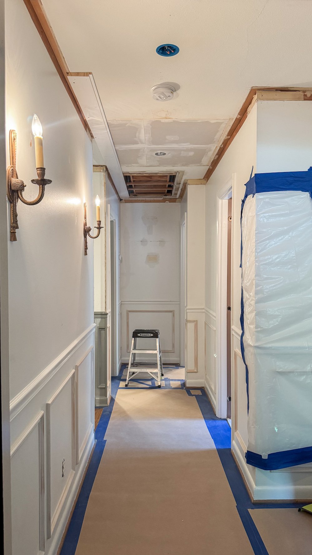 hide attic door with shiplap ceiling