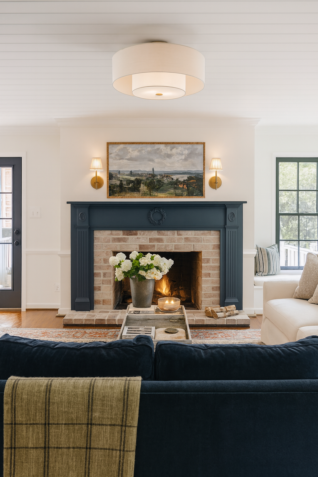 AI living room mockup using ChatGPT to create a creamy white living room with black doors and navy blue fireplace mantel