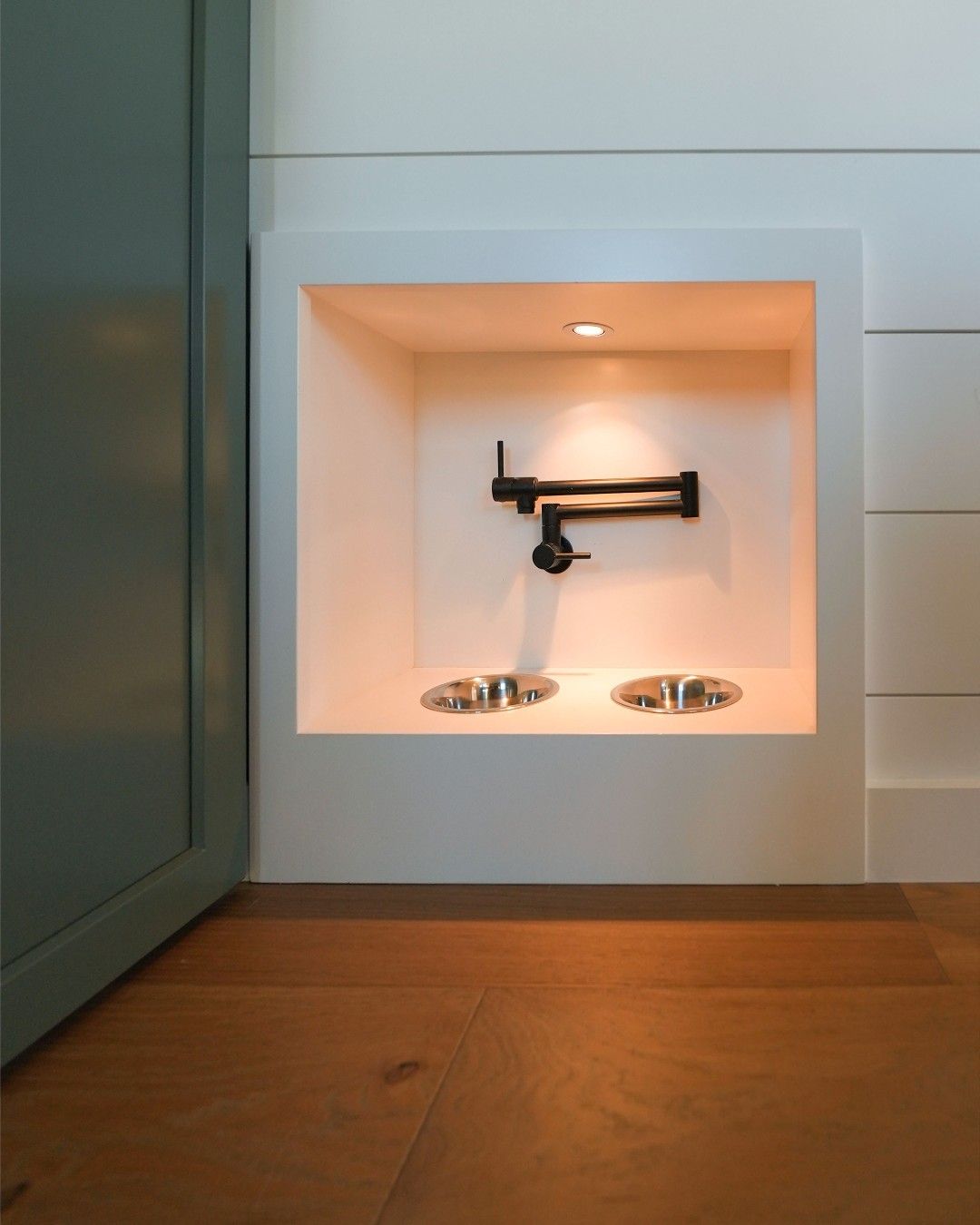 pet feeding station between studs