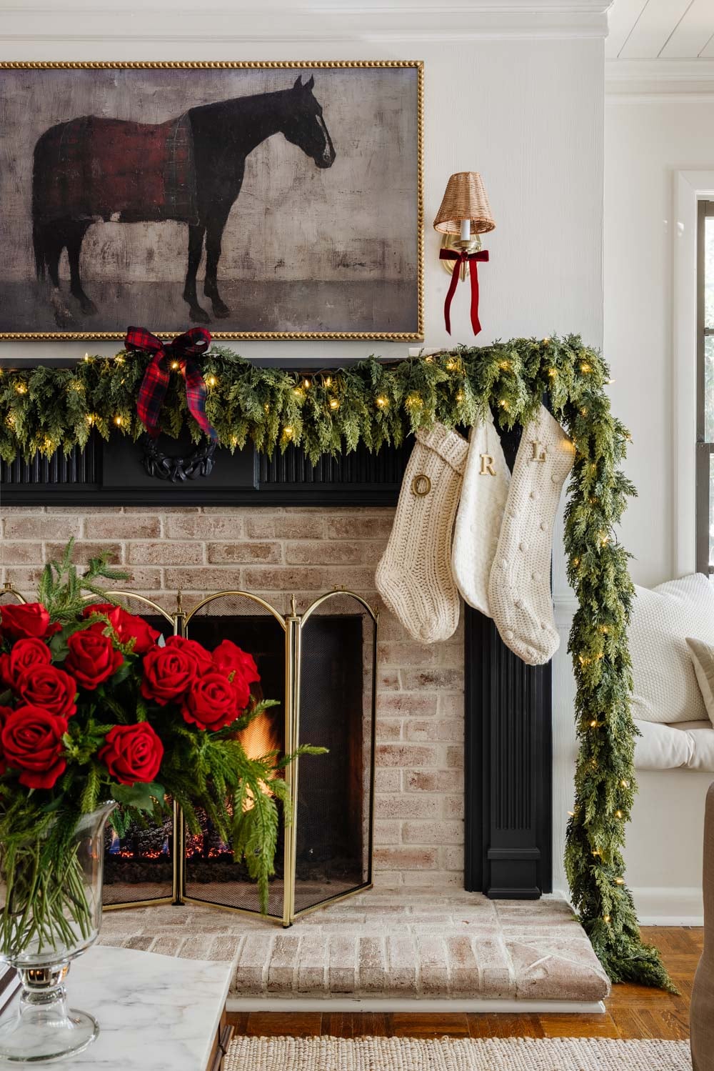 Ralph Lauren Christmas decorating ideas on a budget - navy blue mantel with horse art