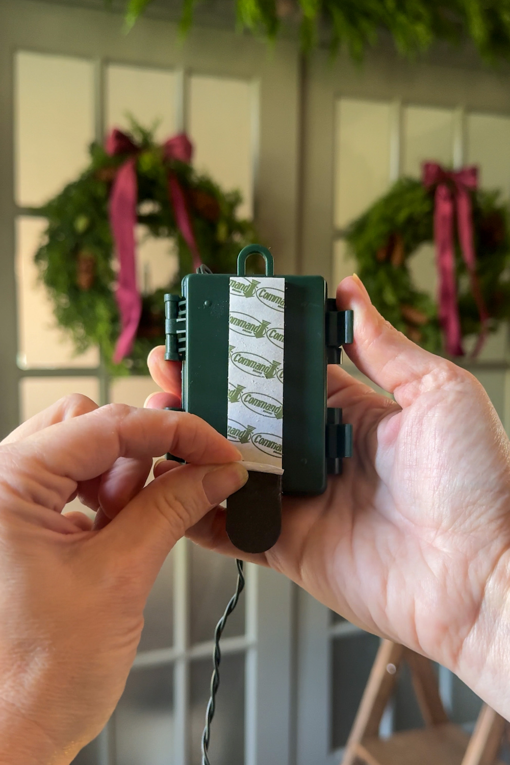 how to hang doorway garland inside with no damage for Christmas