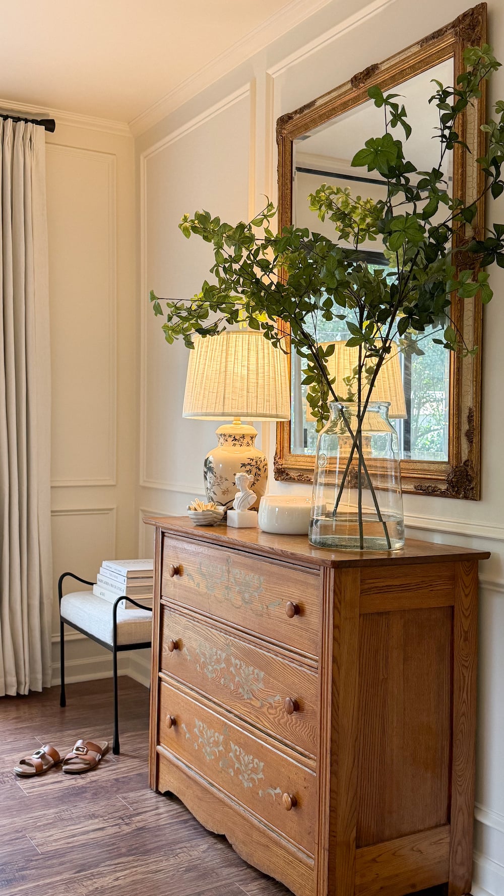 classic modern french country bedroom with layered lighting and canopy bed