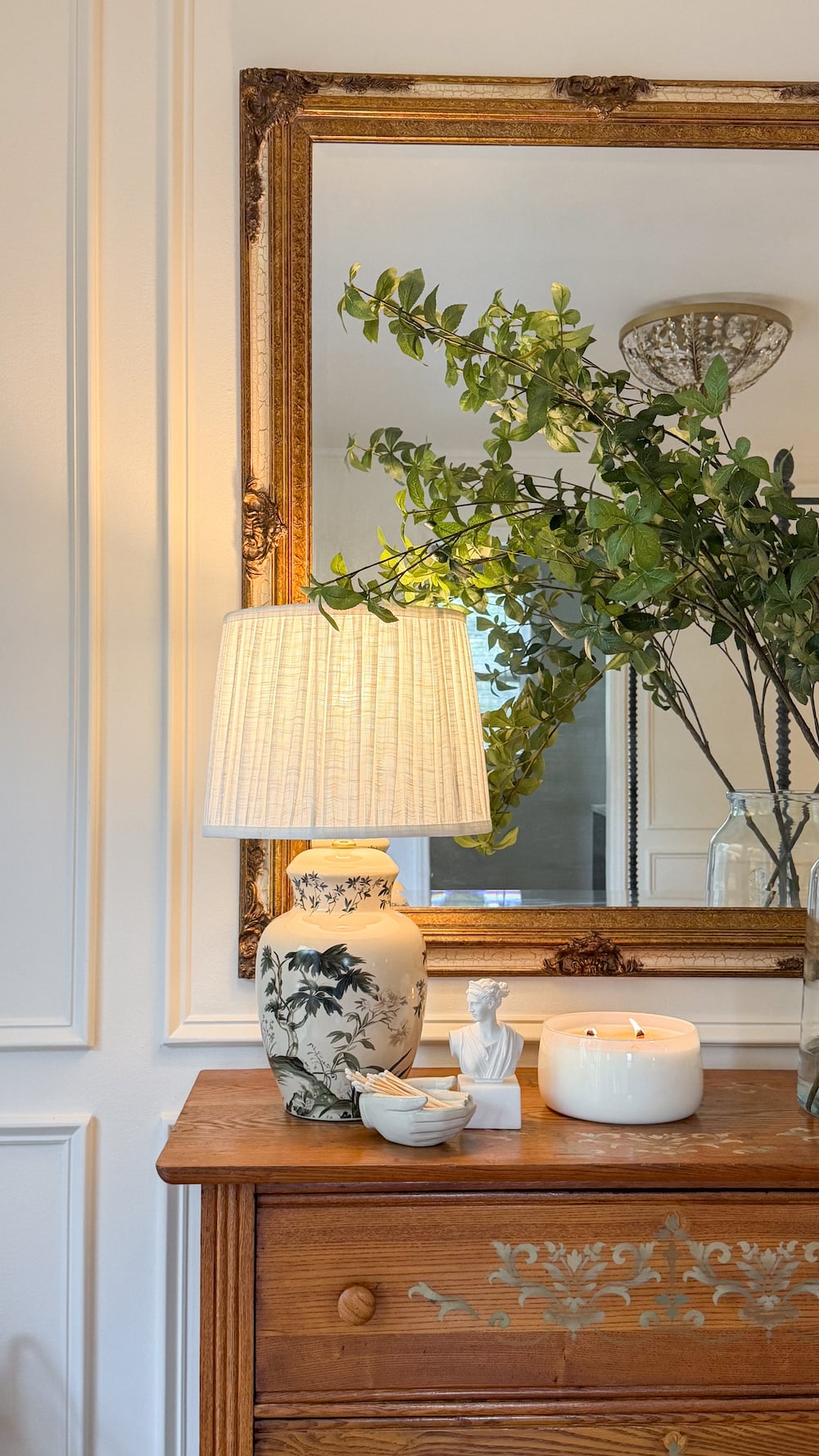 classic modern french country bedroom with layered lighting and canopy bed